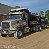 Big Boy Trucking fleet hauling materials